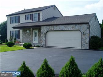 142 West Wolfert Station Road Mickleton, NJ 08056 - Photo 2 of 12 a front view of a house with garden