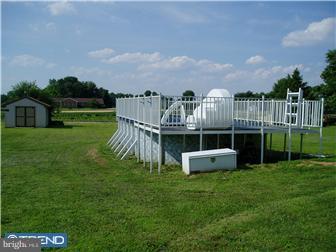 142 West Wolfert Station Road Mickleton, NJ 08056 - Photo 3 of 12 a front view of a house with a yard table and chairs