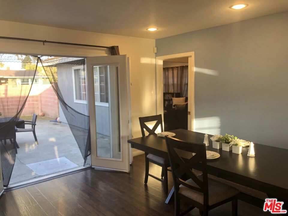 549 East Collamer Drive Carson, CA 90746 - Photo 4 of 10 a view of a dining room with furniture window and wooden floor