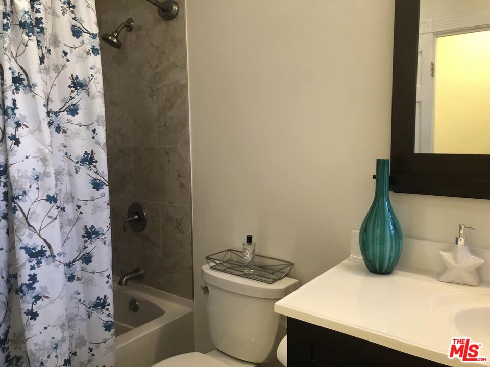 549 East Collamer Drive Carson, CA 90746 - Photo 7 of 10 a bathroom with a sink toilet and shower