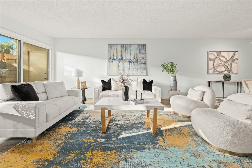 540 Fairview Avenue, Unit 27 Arcadia, CA 91007 - Photo 11 of 40 a living room with furniture and a large window