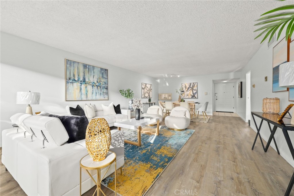 540 Fairview Avenue, Unit 27 Arcadia, CA 91007 - Photo 12 of 40 a living room with furniture and a wooden floor