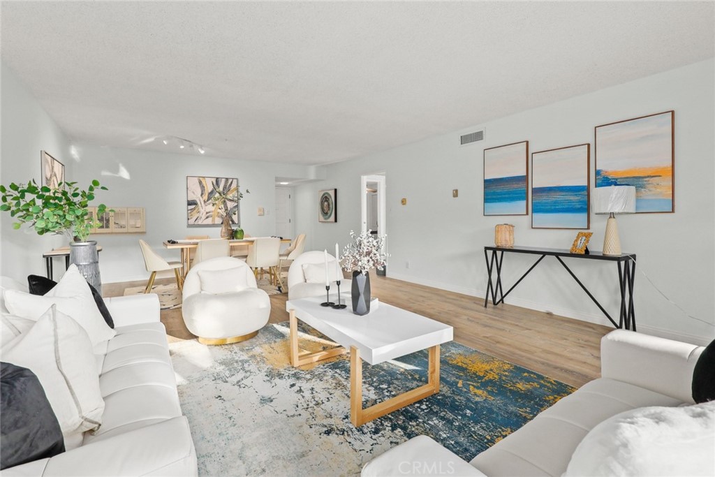 540 Fairview Avenue, Unit 27 Arcadia, CA 91007 - Photo 13 of 40 a living room with furniture and a table