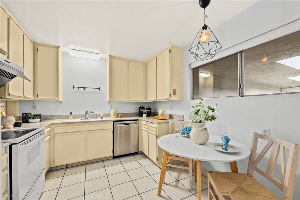 540 Fairview Avenue, Unit 27 Arcadia, CA 91007 - Photo 14 of 40 a kitchen with a sink cabinets and window