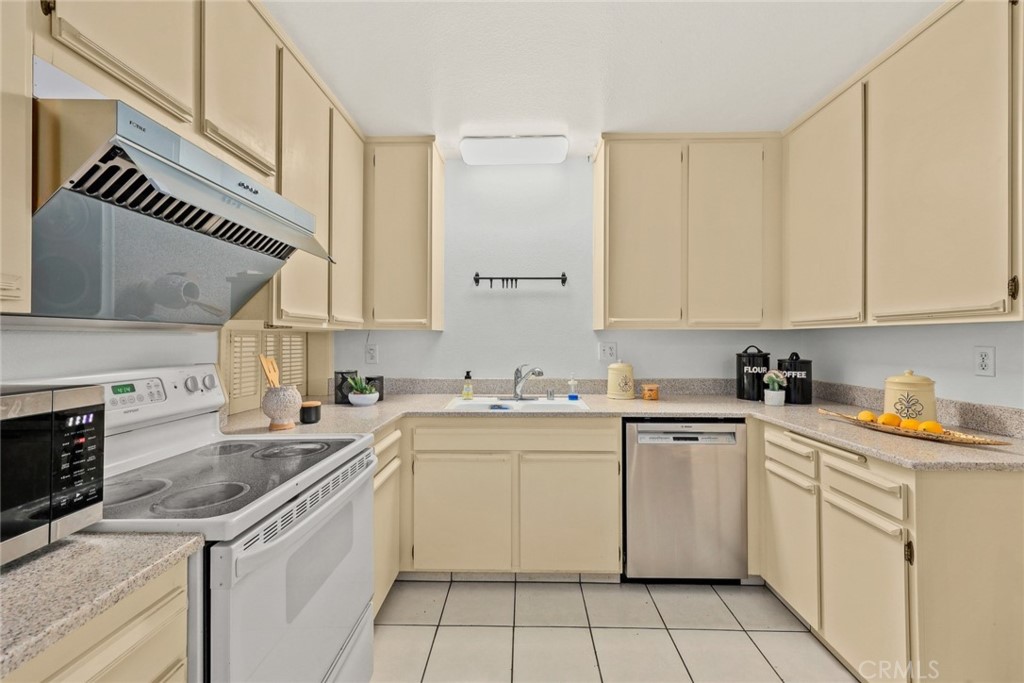 540 Fairview Avenue, Unit 27 Arcadia, CA 91007 - Photo 15 of 40 a kitchen with a sink and cabinets