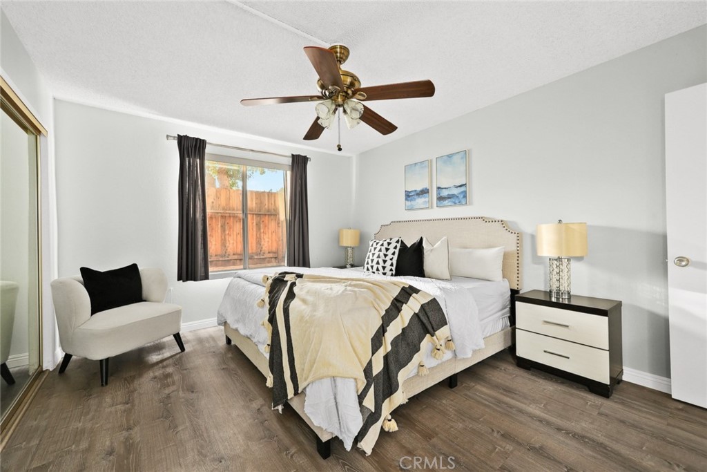 540 Fairview Avenue, Unit 27 Arcadia, CA 91007 - Photo 19 of 40 a spacious bedroom with a bed and a couch