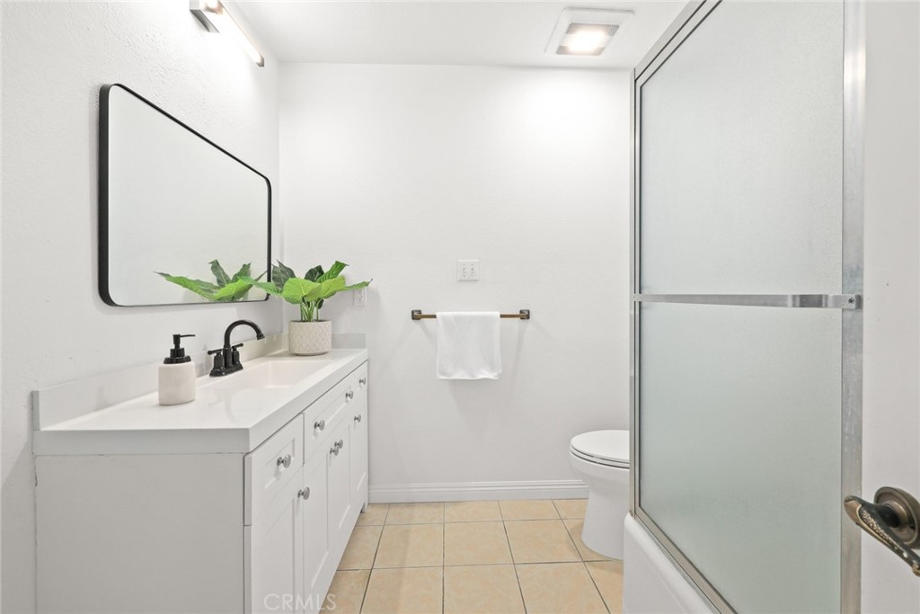 540 Fairview Avenue, Unit 27 Arcadia, CA 91007 - Photo 23 of 40 a bathroom with a sink a toilet and a mirror