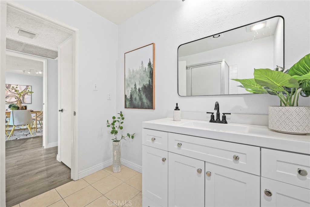540 Fairview Avenue, Unit 27 Arcadia, CA 91007 - Photo 24 of 40 a bathroom with a sink and a mirror