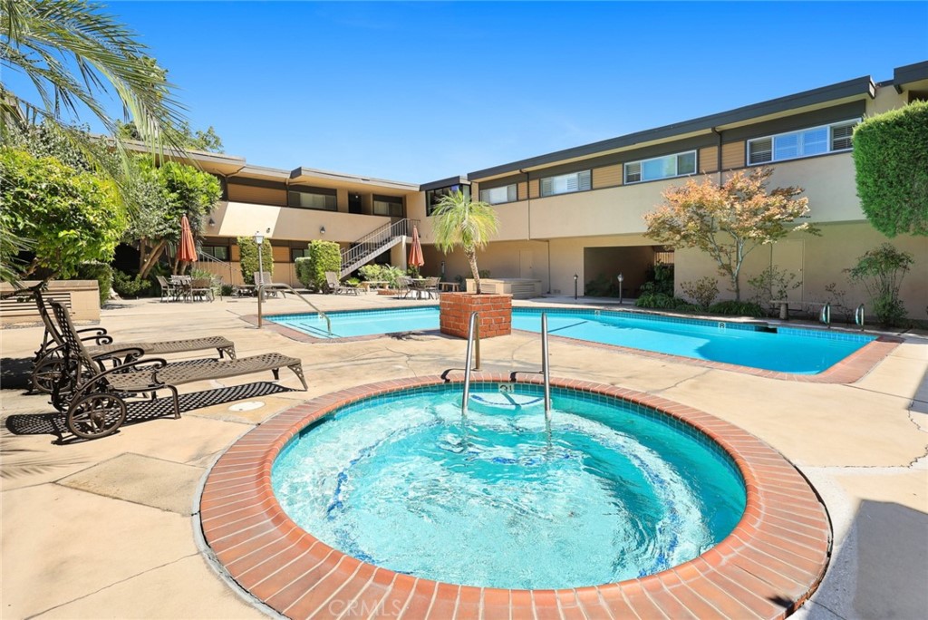 540 Fairview Avenue, Unit 27 Arcadia, CA 91007 - Photo 30 of 40 a swimming pool with outdoor seating