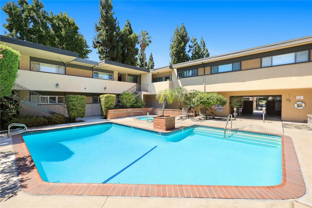 540 Fairview Avenue, Unit 27 Arcadia, CA 91007 - Photo 3 of 40 a view of a patio with swimming pool table and chairs