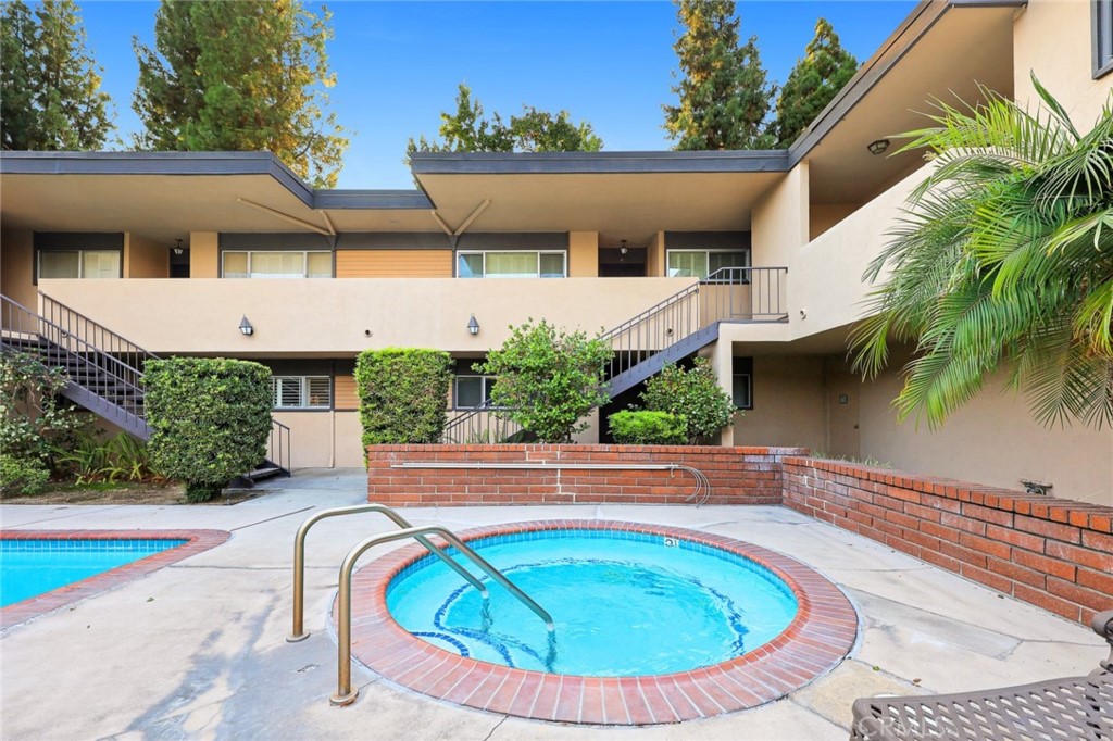 540 Fairview Avenue, Unit 27 Arcadia, CA 91007 - Photo 5 of 40 an aerial view of a house with swimming pool
