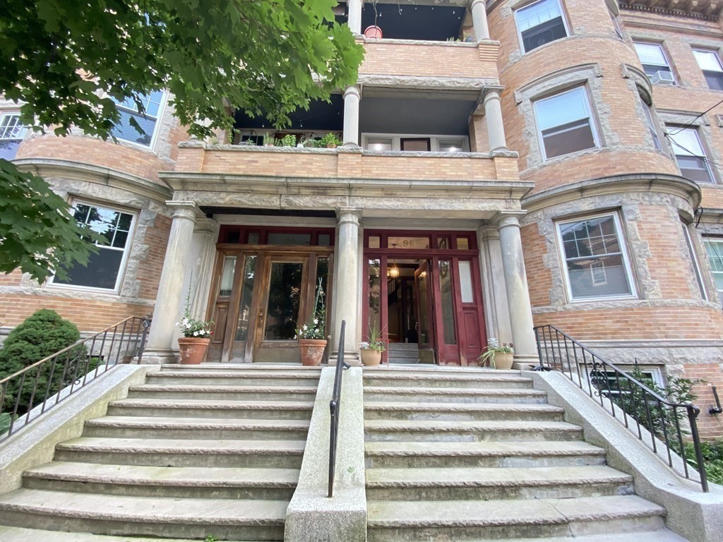 96 Naples Road, Unit 3 Brookline, MA 02446 - Photo 3 of 12 a view of a building with a outdoor space