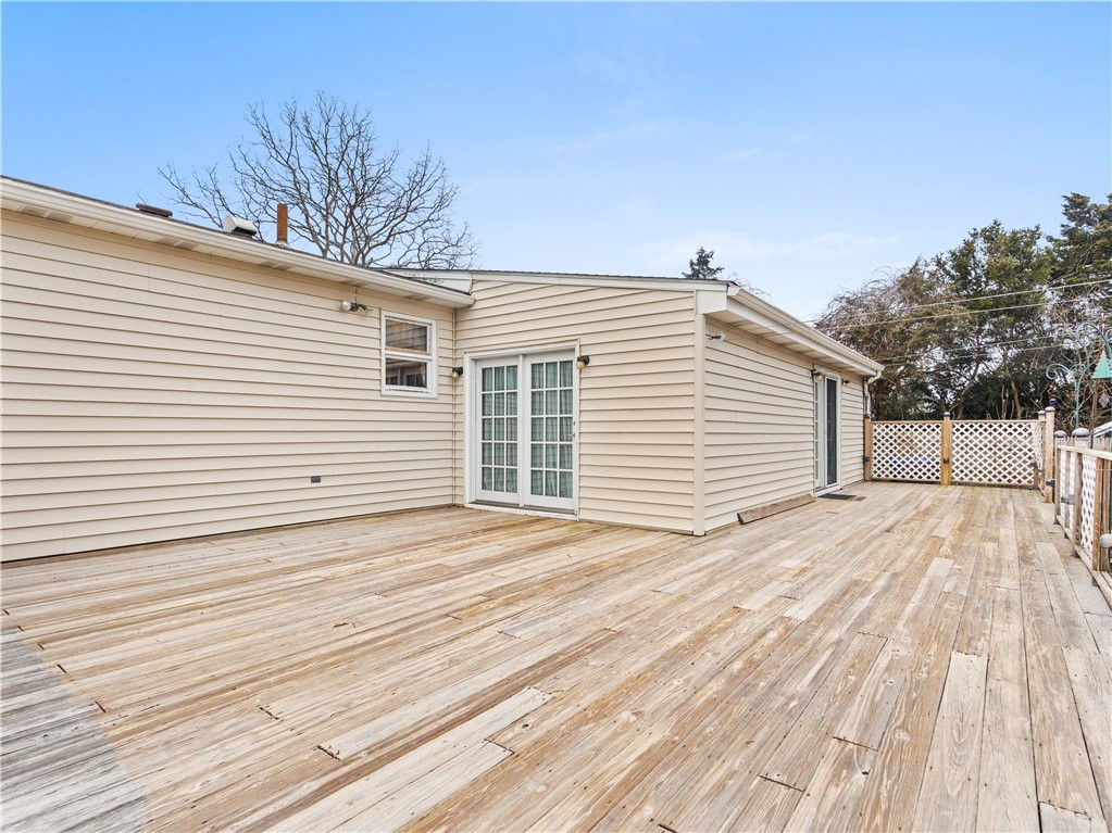 46 Ridgeway Drive Warren, RI 02885 - Photo 12 of 22 Large deck off of Family room