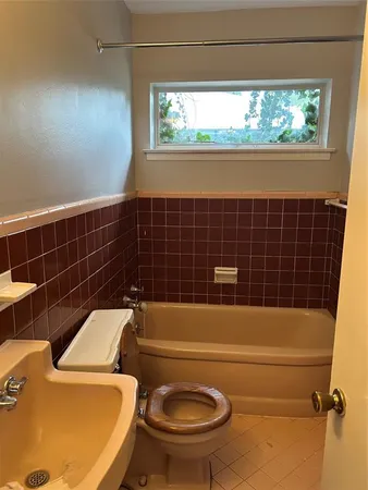 a bathroom with a sink and a toilet