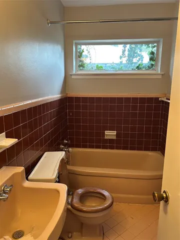 a bathroom with a sink and a toilet