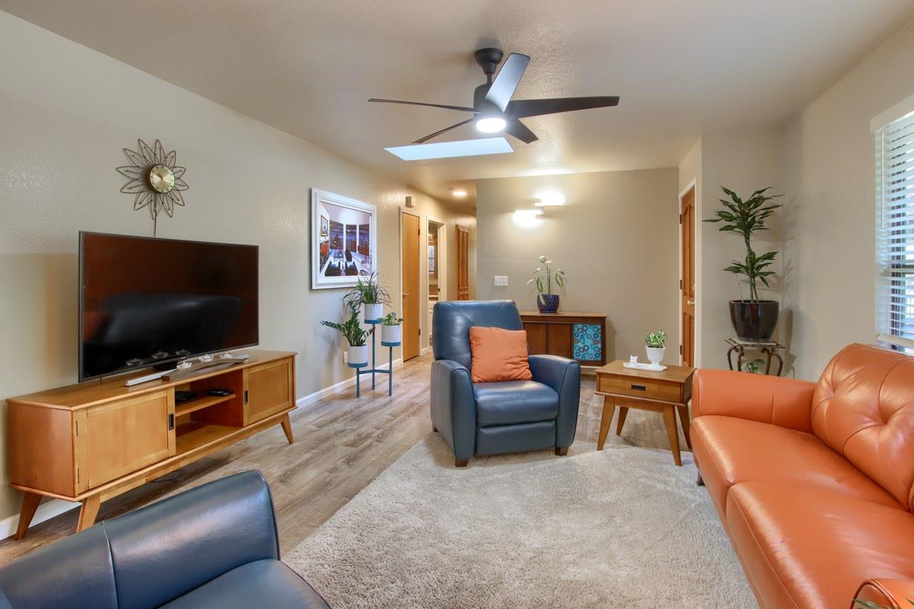 36555 Mudge Ranch Road Coarsegold, CA 93614 - Photo 12 of 80 a living room with furniture and a flat screen tv