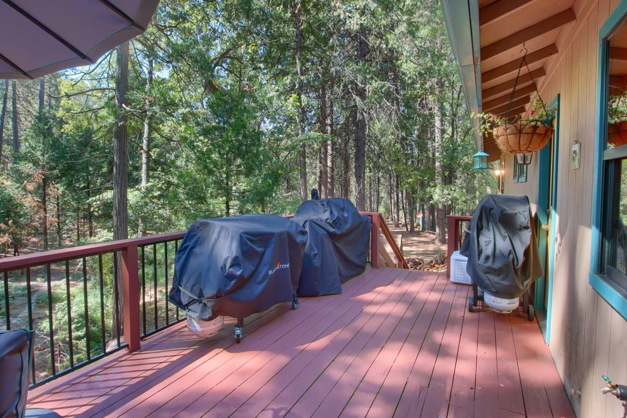 36555 Mudge Ranch Road Coarsegold, CA 93614 - Photo 35 of 80 a view of balcony with furniture and wooden floor