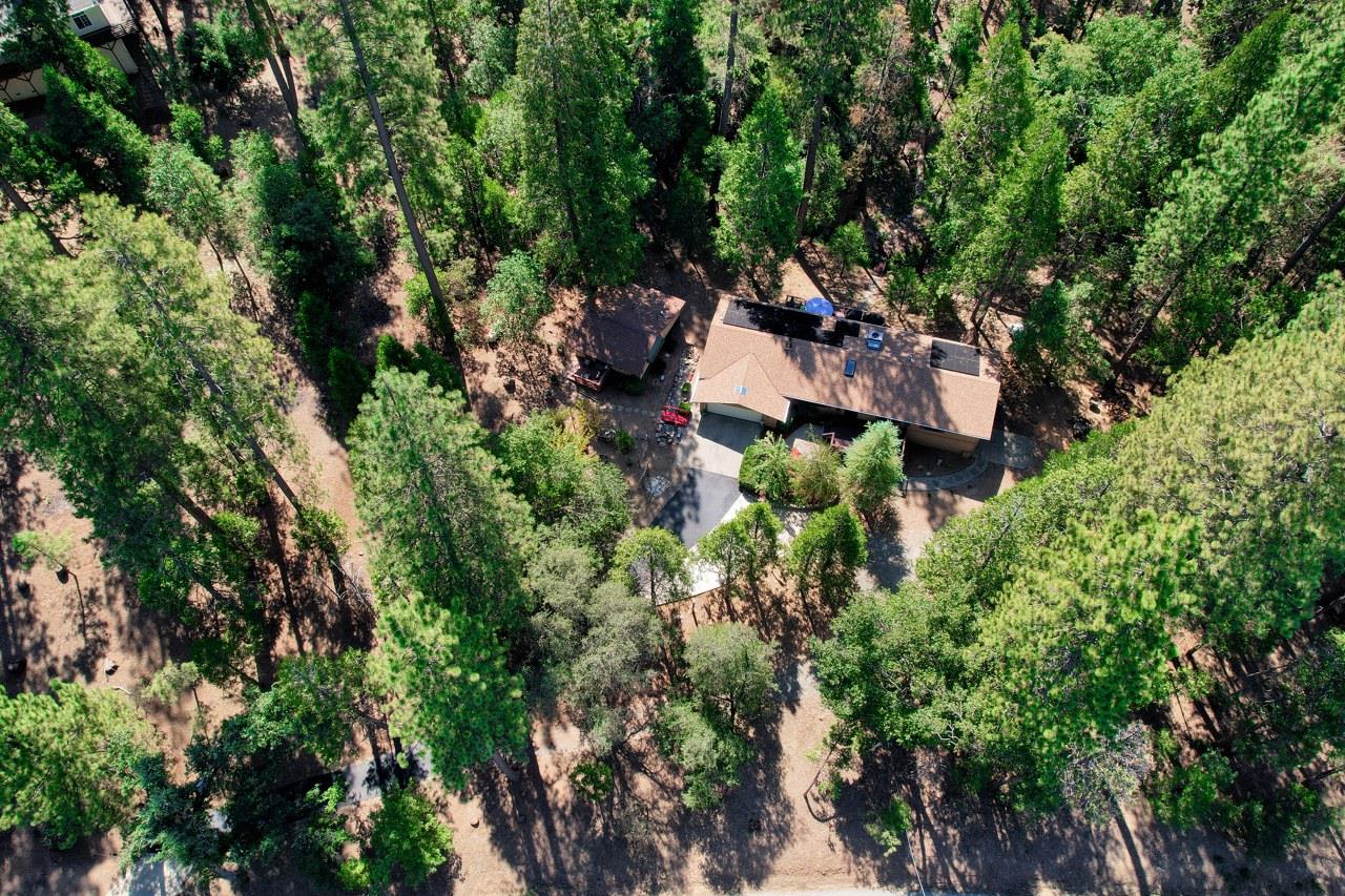 36555 Mudge Ranch Road Coarsegold, CA 93614 - Photo 63 of 80 an aerial view of a house with a yard