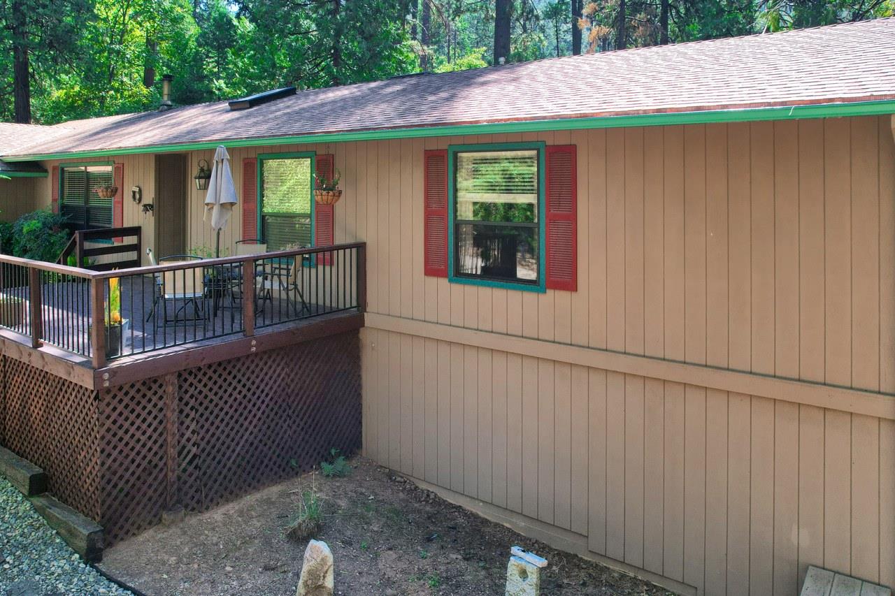 36555 Mudge Ranch Road Coarsegold, CA 93614 - Photo 70 of 80 a view of a house with backyard and porch