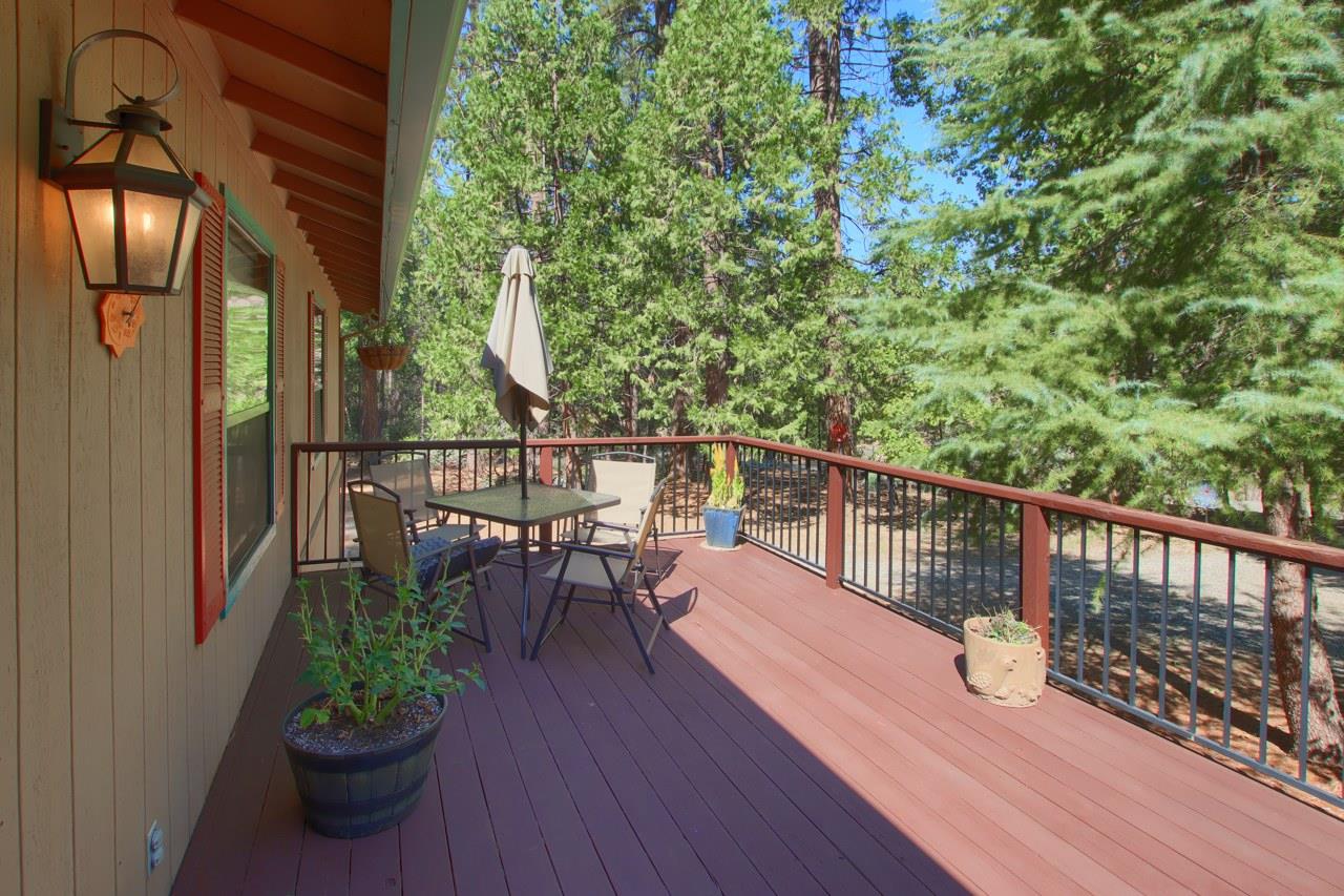 36555 Mudge Ranch Road Coarsegold, CA 93614 - Photo 7 of 80 a view of a balcony with chairs