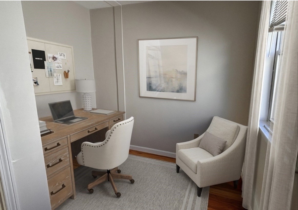 206 H Street, Unit 3 Boston, MA 02127 - Photo 6 of 8 a view of a workspace with furniture and bathroom