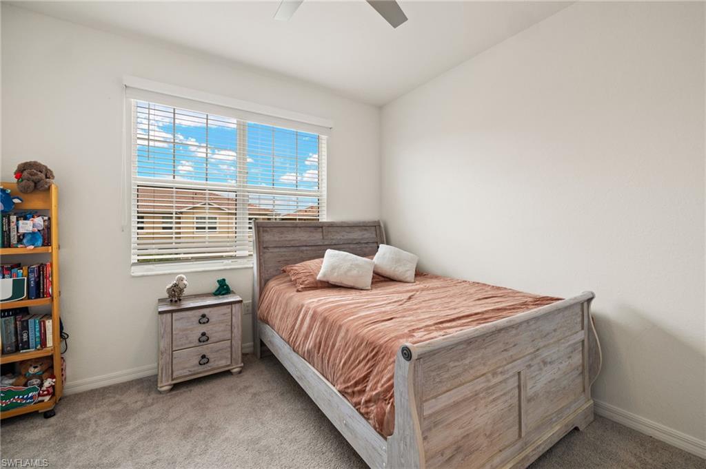 2934 Citrus Street Naples, FL 34120 - Photo 18 of 29 a bedroom with a bed and a window