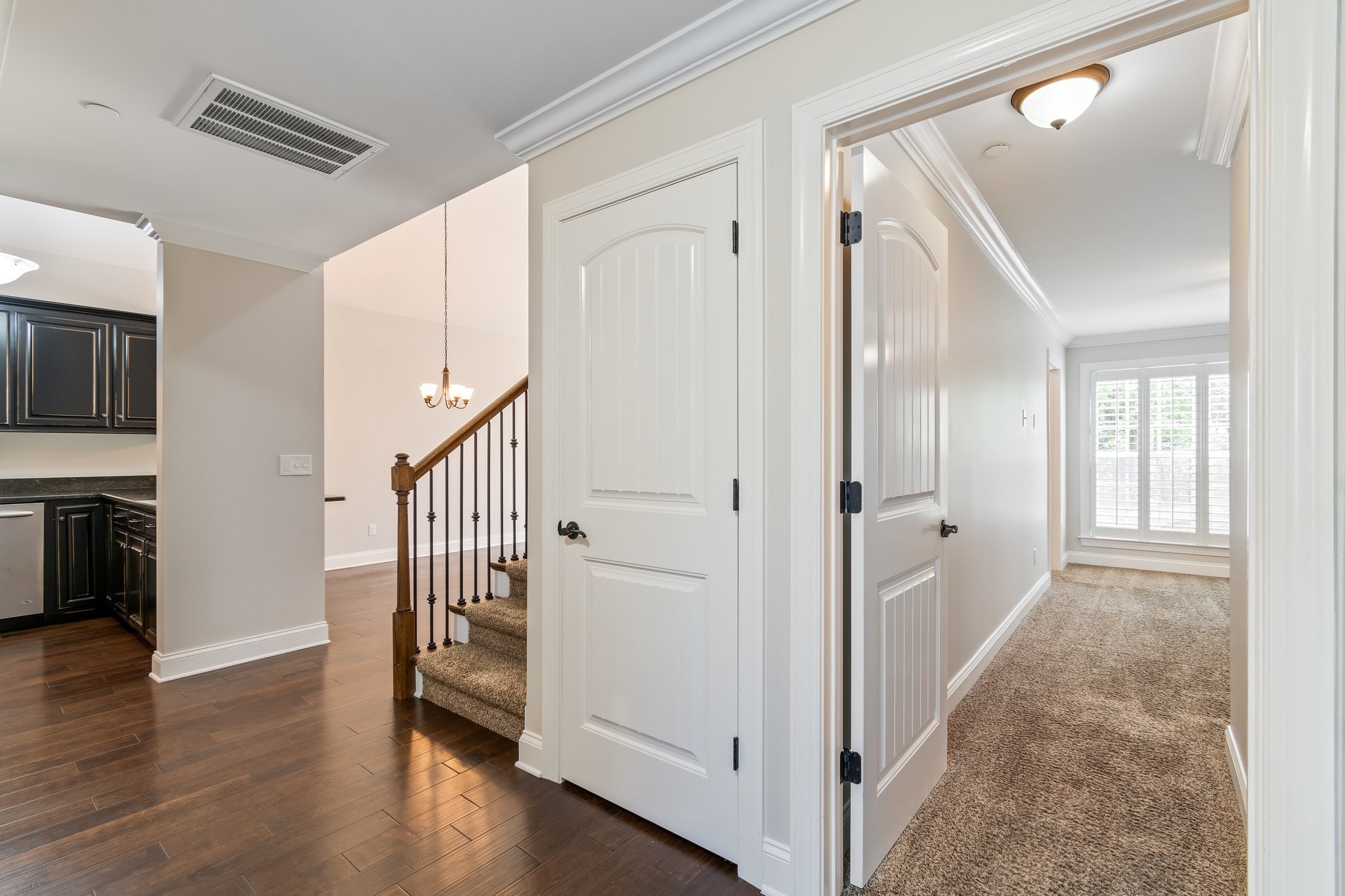 1041 Irish Way Spring Hill, TN 37174 - Photo 14 of 38 a view of a hallway with wooden floor and staircase