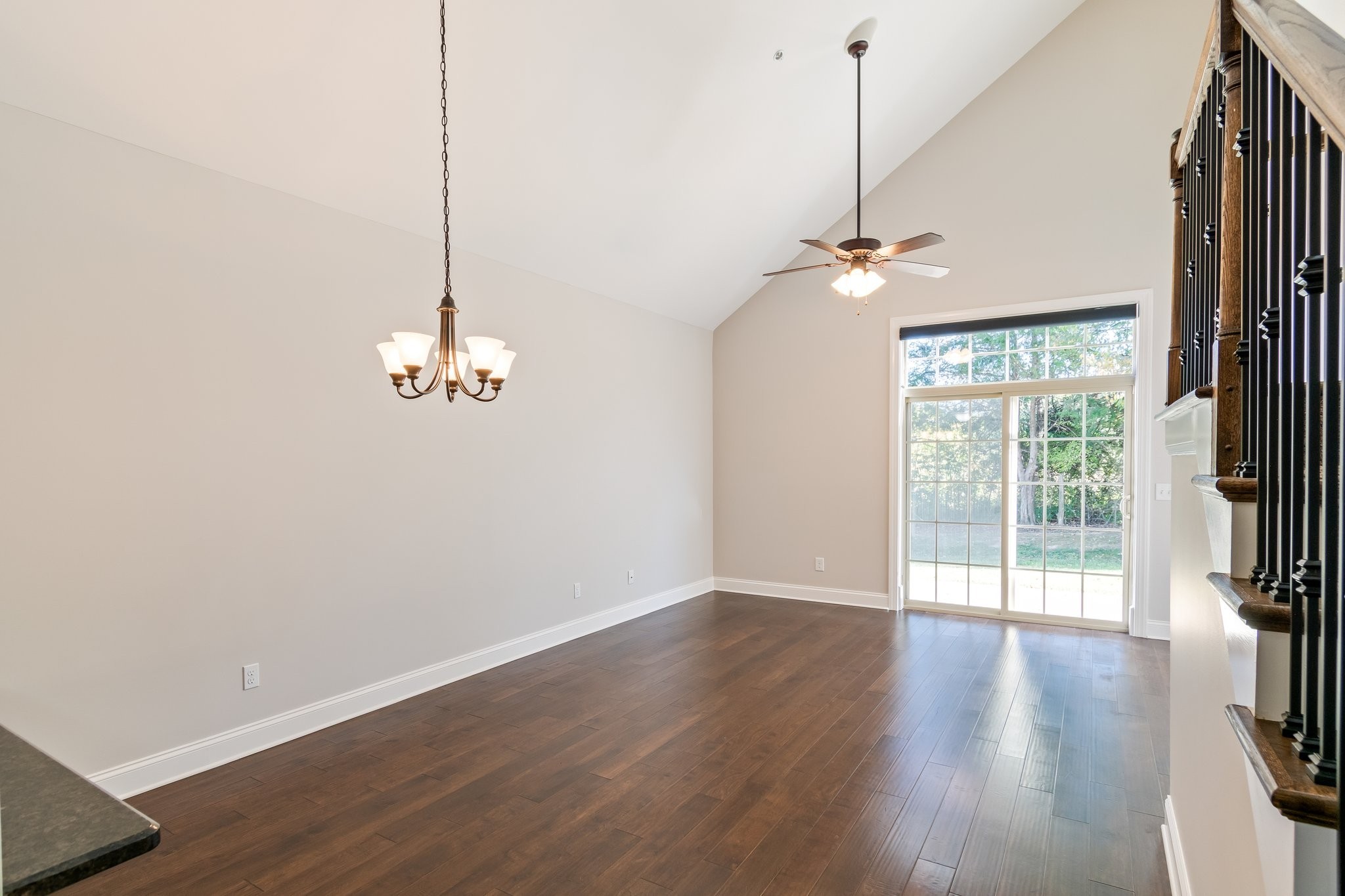 1041 Irish Way Spring Hill, TN 37174 - Photo 3 of 38 a view of empty room with wooden floor and fan