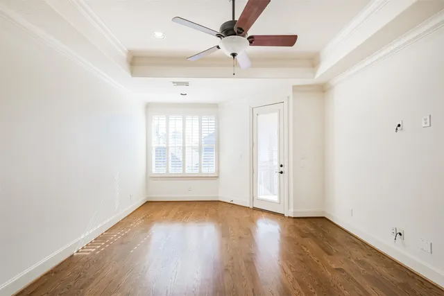 a bathroom with a tub sink toilet and mirror