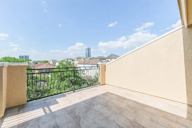 a view of a city from a balcony