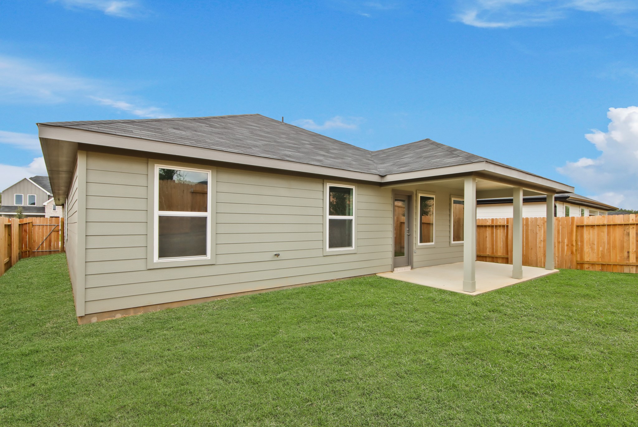 4226 Multnomah Falls Drive Conroe, TX 77303 - Photo 20 of 31 a front view of a house with a yard and garage