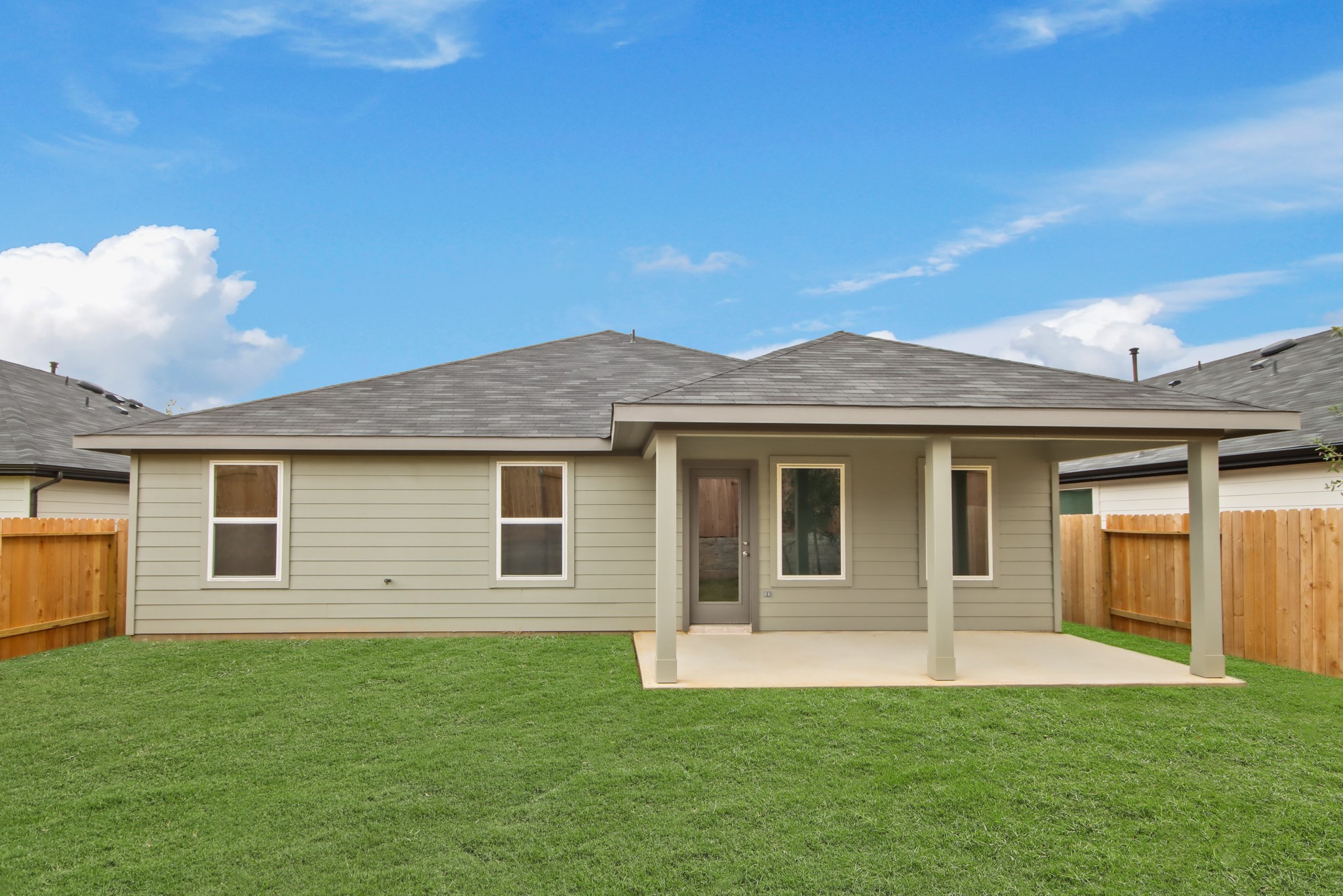 4226 Multnomah Falls Drive Conroe, TX 77303 - Photo 21 of 31 a view of a house with a backyard