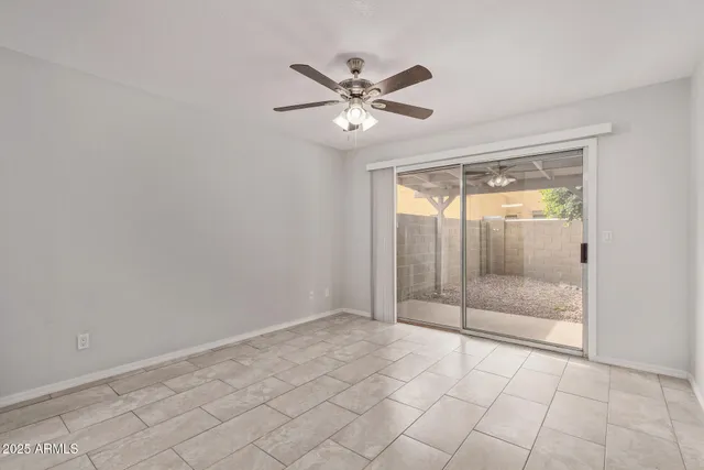 a view of an empty room with a glass door