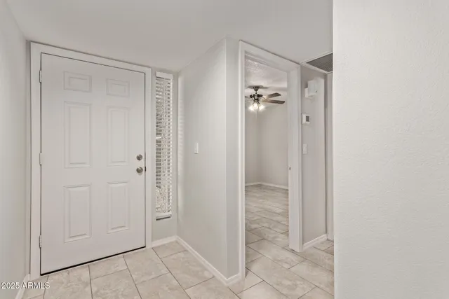 a view of a bathroom with a glass door