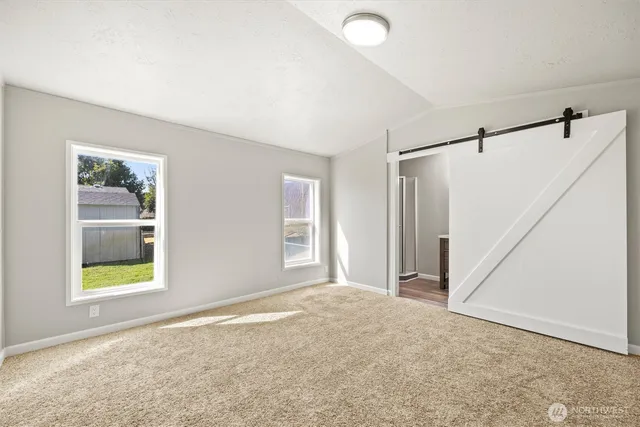 a view of livingroom with hardwood floor and window