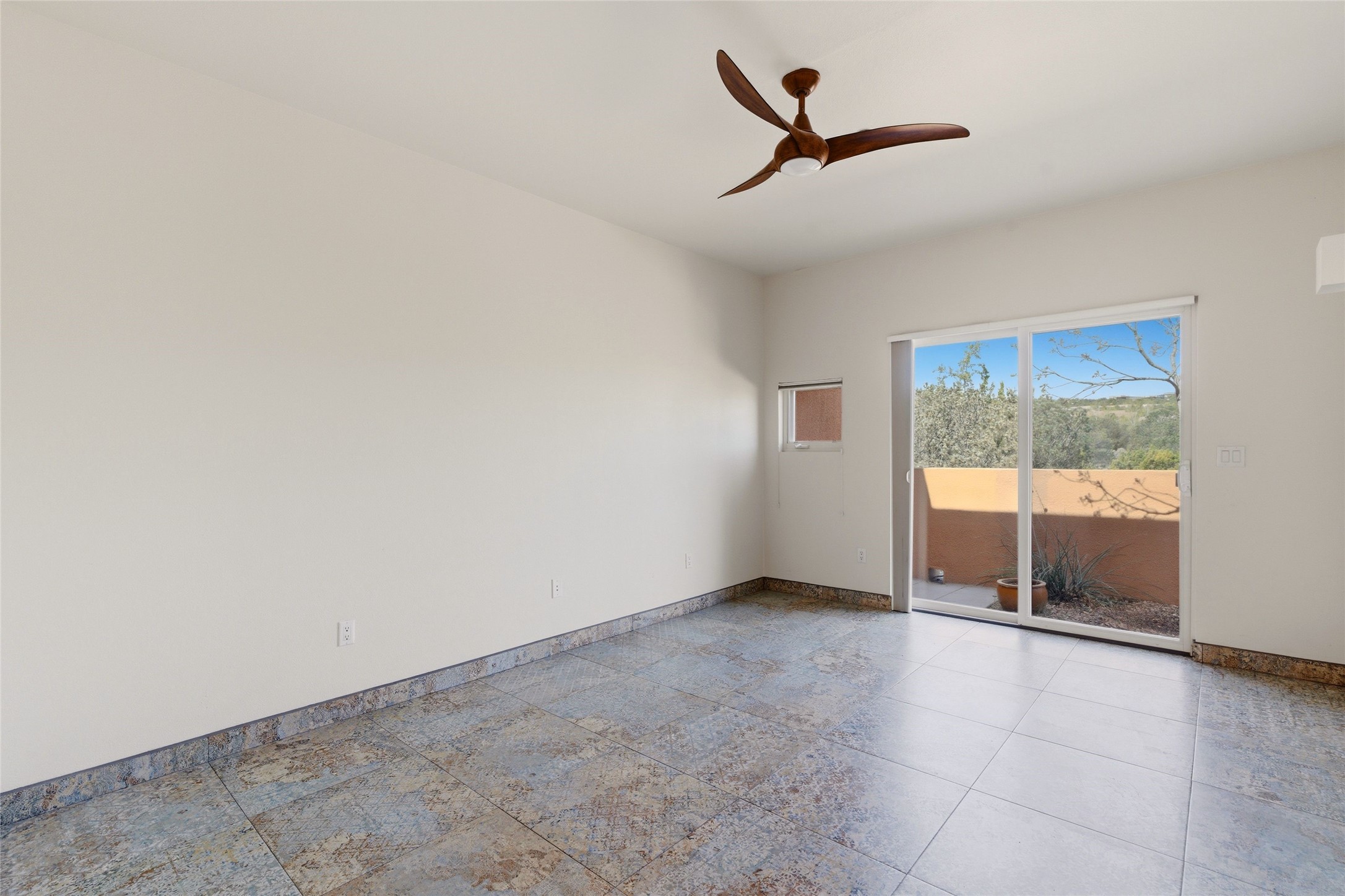 1500 Avenida Rincon, Unit 102 Santa Fe, NM 87506 - Photo 11 of 23 Downstairs en suite bedroom