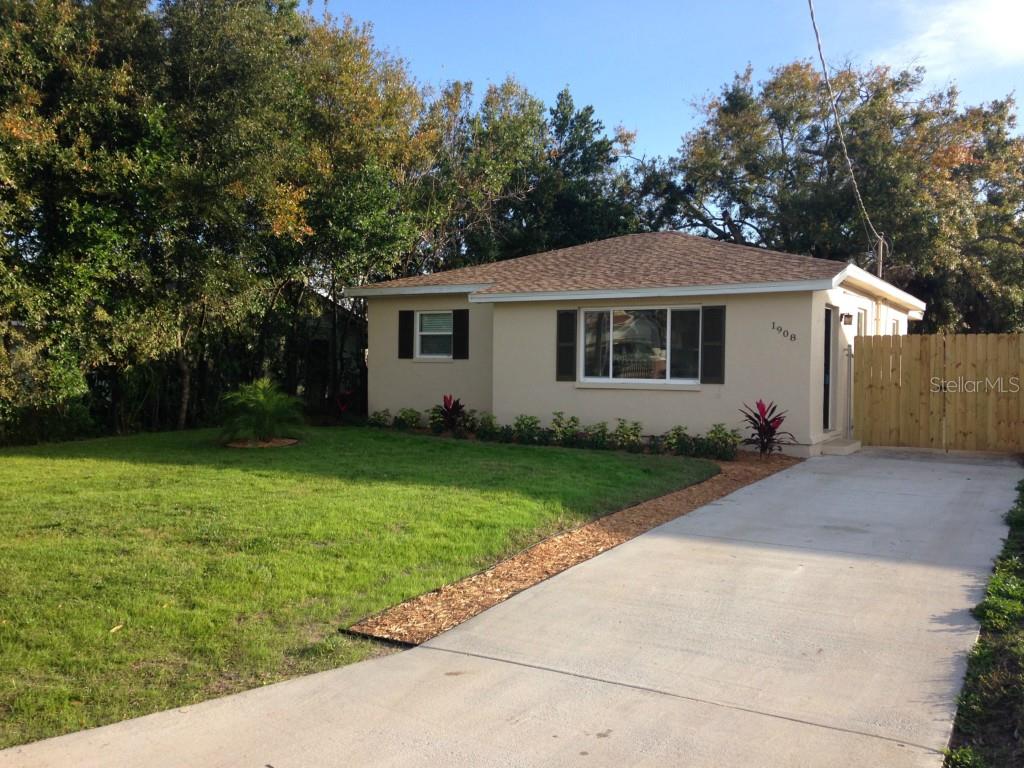 1908 West Grace Street Tampa, FL 33607 - Photo 1 of 1 a front view of house with yard and green space