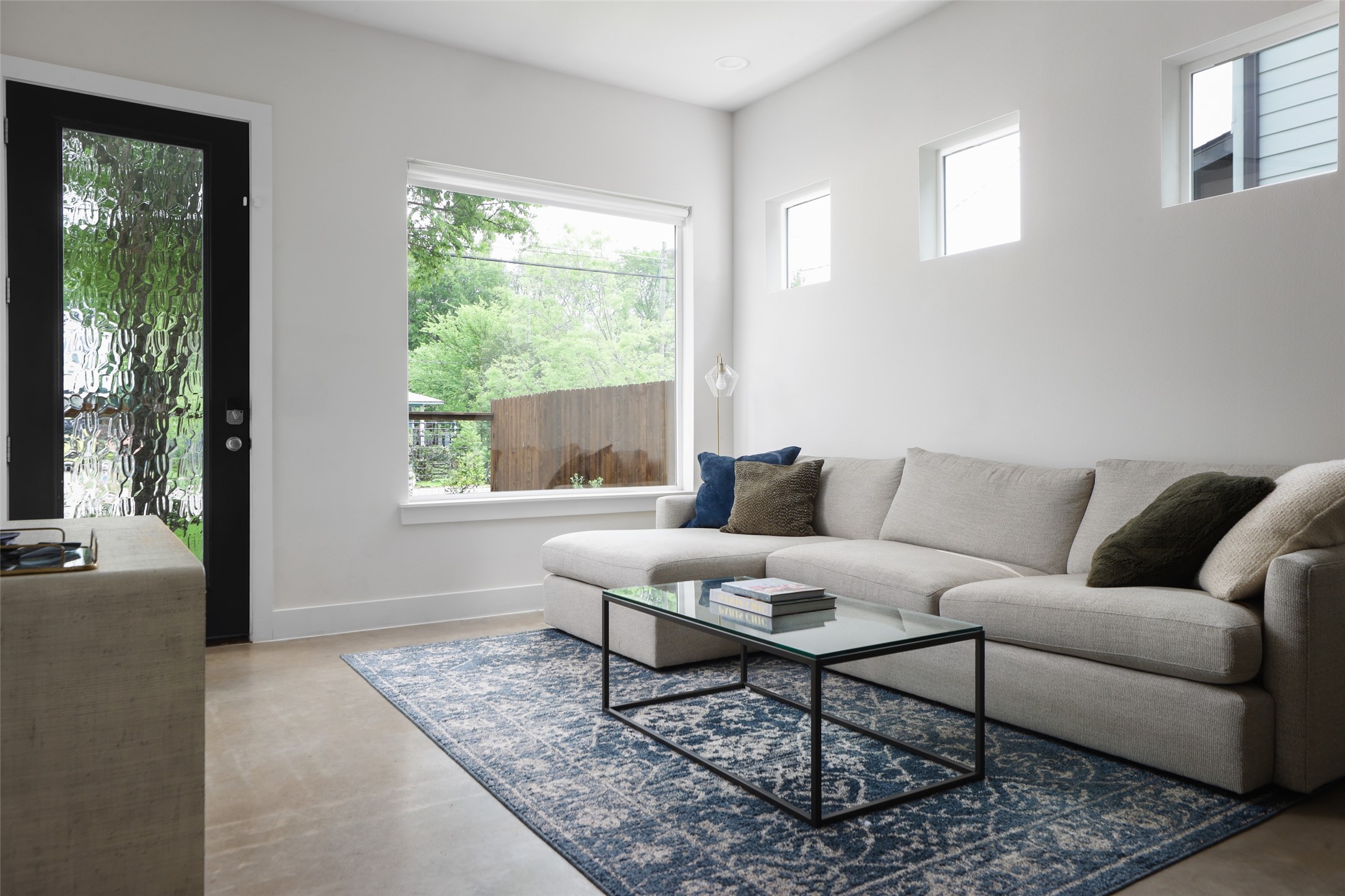 1120 Omega Avenue, Unit 1 Austin, TX 78721 - Photo 7 of 24 a living room with furniture and a window