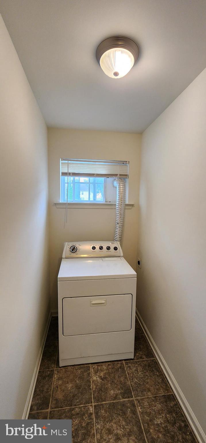 335 Paradee Drive Dover, DE 19904 - Photo 34 of 45 a utility room with washer and dryer