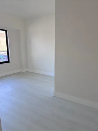 a kitchen with a window