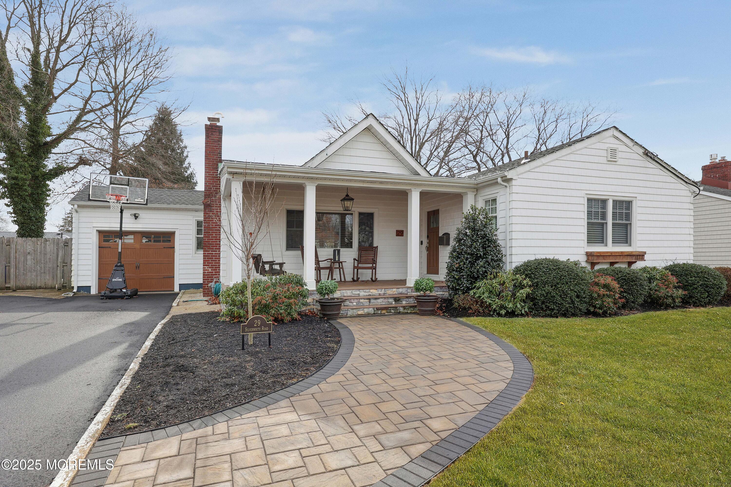 29 SilverWhite Road Little Silver, NJ 07739 - Photo 27 of 38 a view of a house with backyard and garden