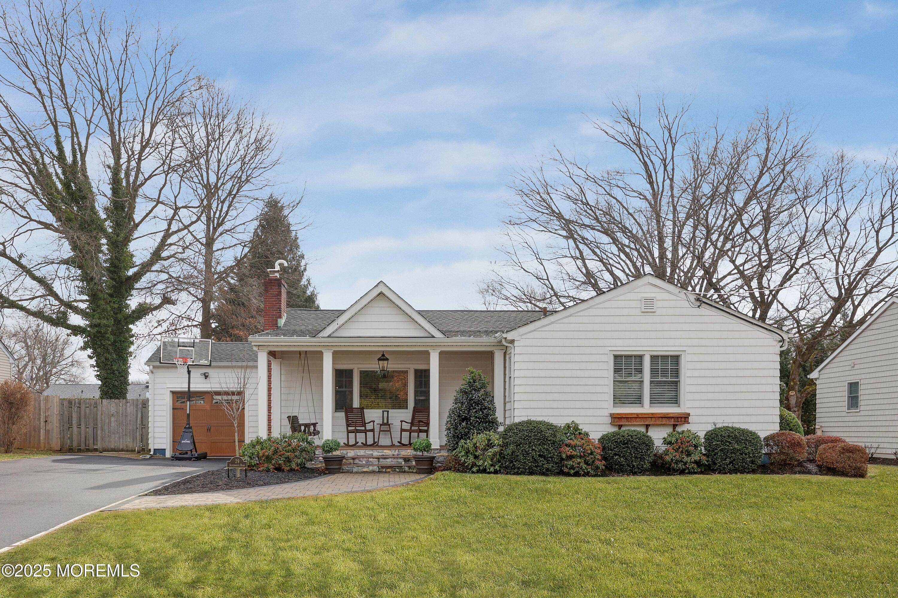 29 SilverWhite Road Little Silver, NJ 07739 - Photo 29 of 38 a front view of a house with a yard