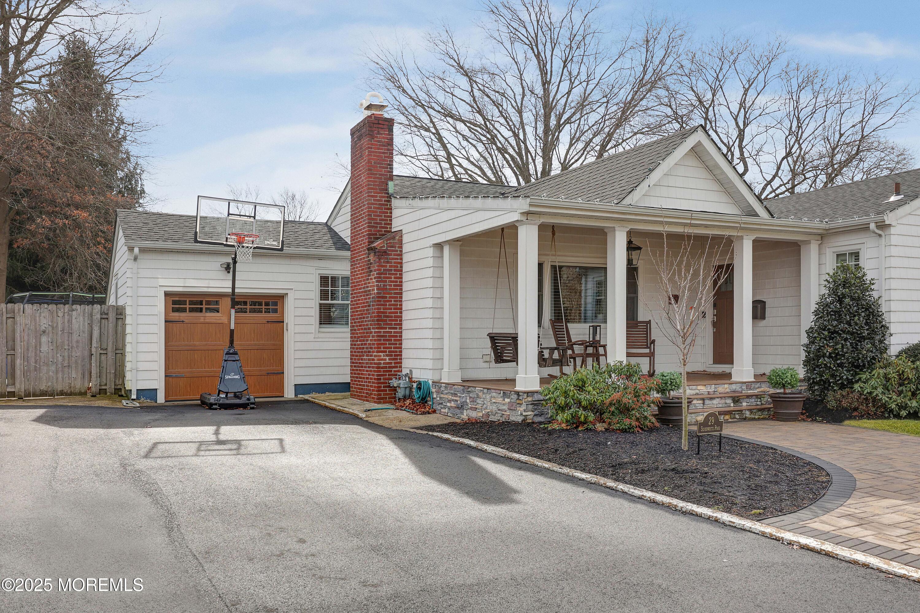 29 SilverWhite Road Little Silver, NJ 07739 - Photo 30 of 38 a front view of a house with yard