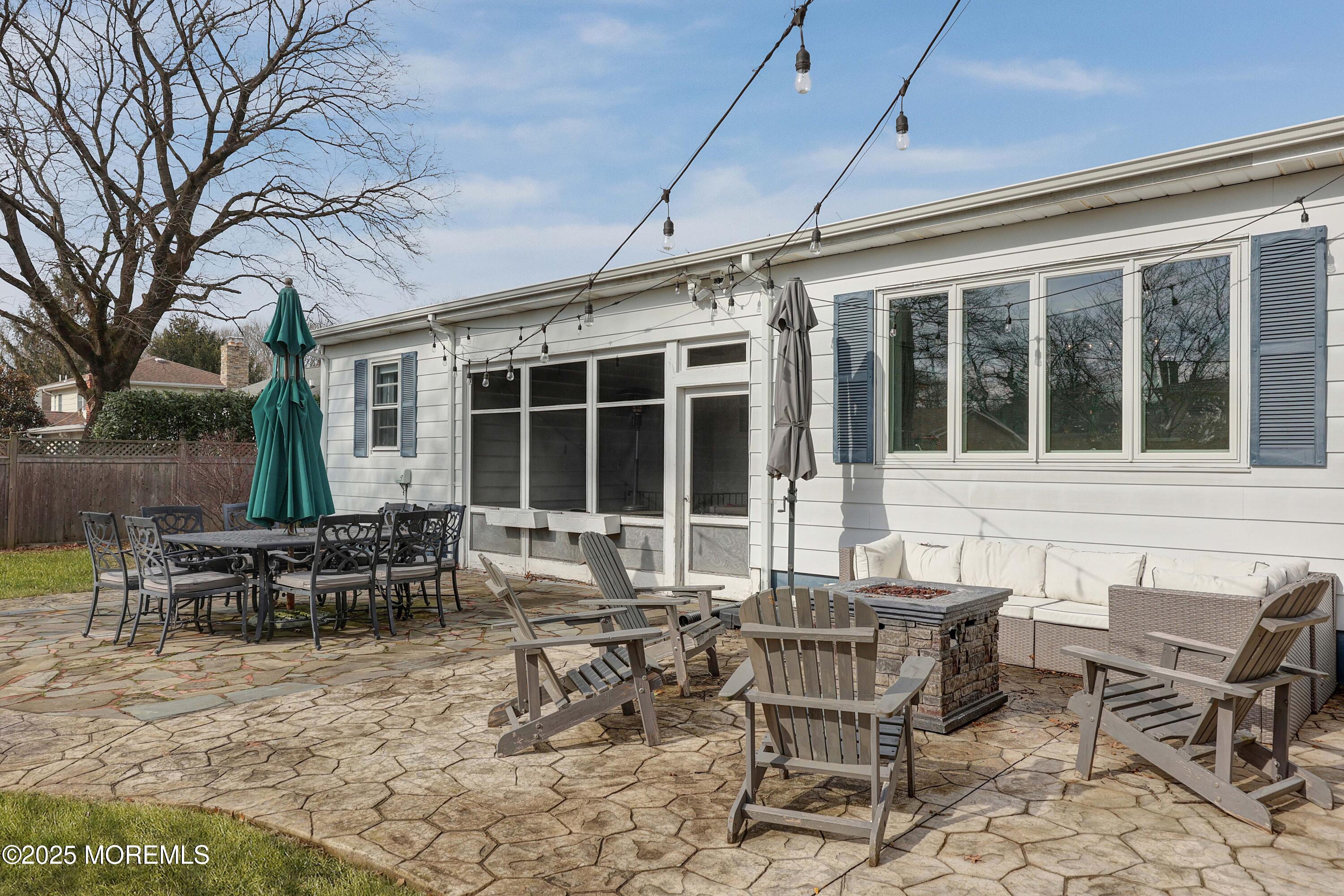 29 SilverWhite Road Little Silver, NJ 07739 - Photo 33 of 38 a view of a house with backyard sitting area