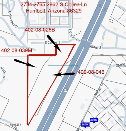 a street sign sitting on a shelf of a building