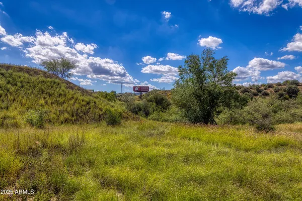 a sunset view with swimming pool