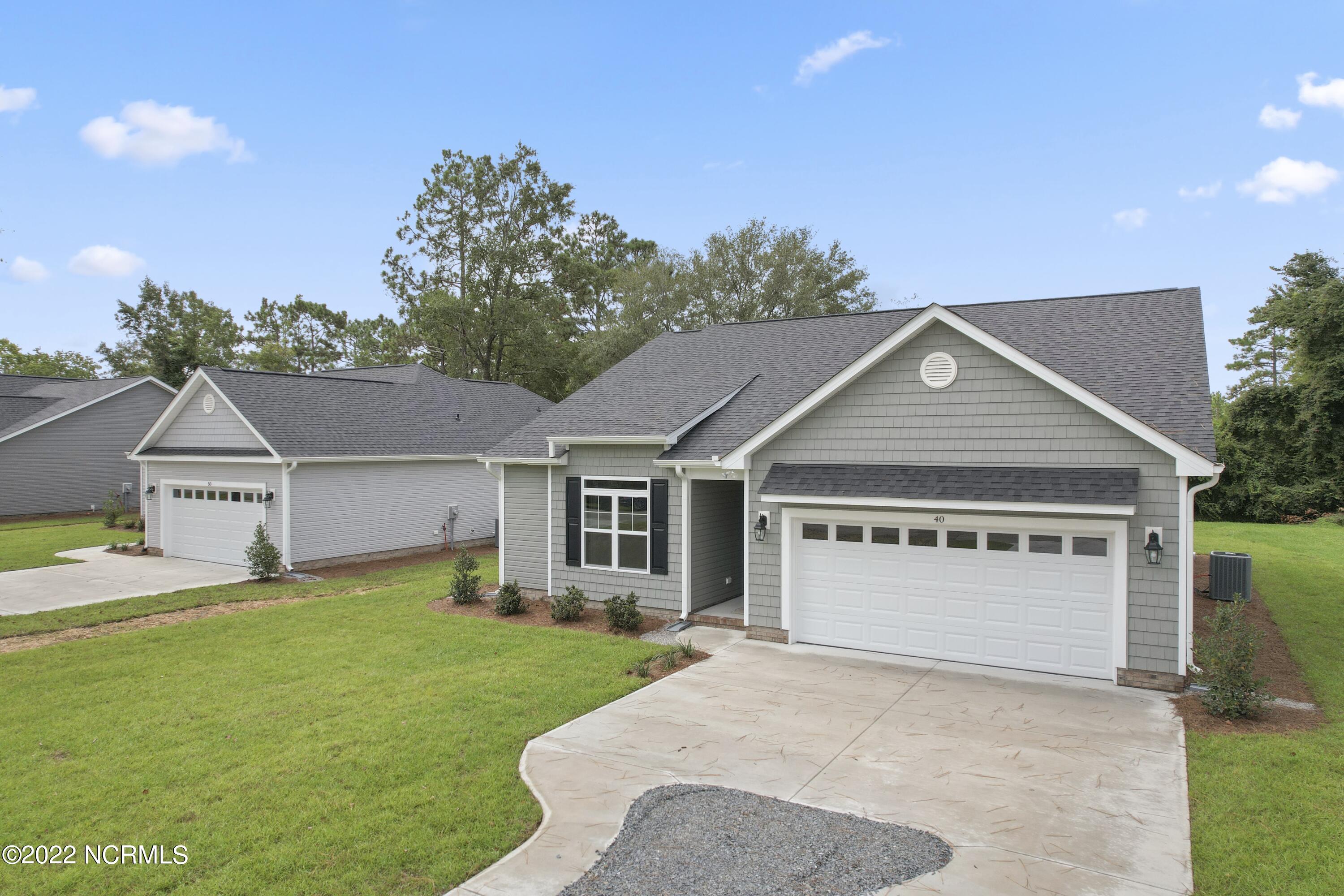 1081 Filmore Road Southport, NC 28461 - Photo 2 of 52 Previously Built Home Picture is a representation of what is to be built. Colors and finishes will vary and are subject to change.