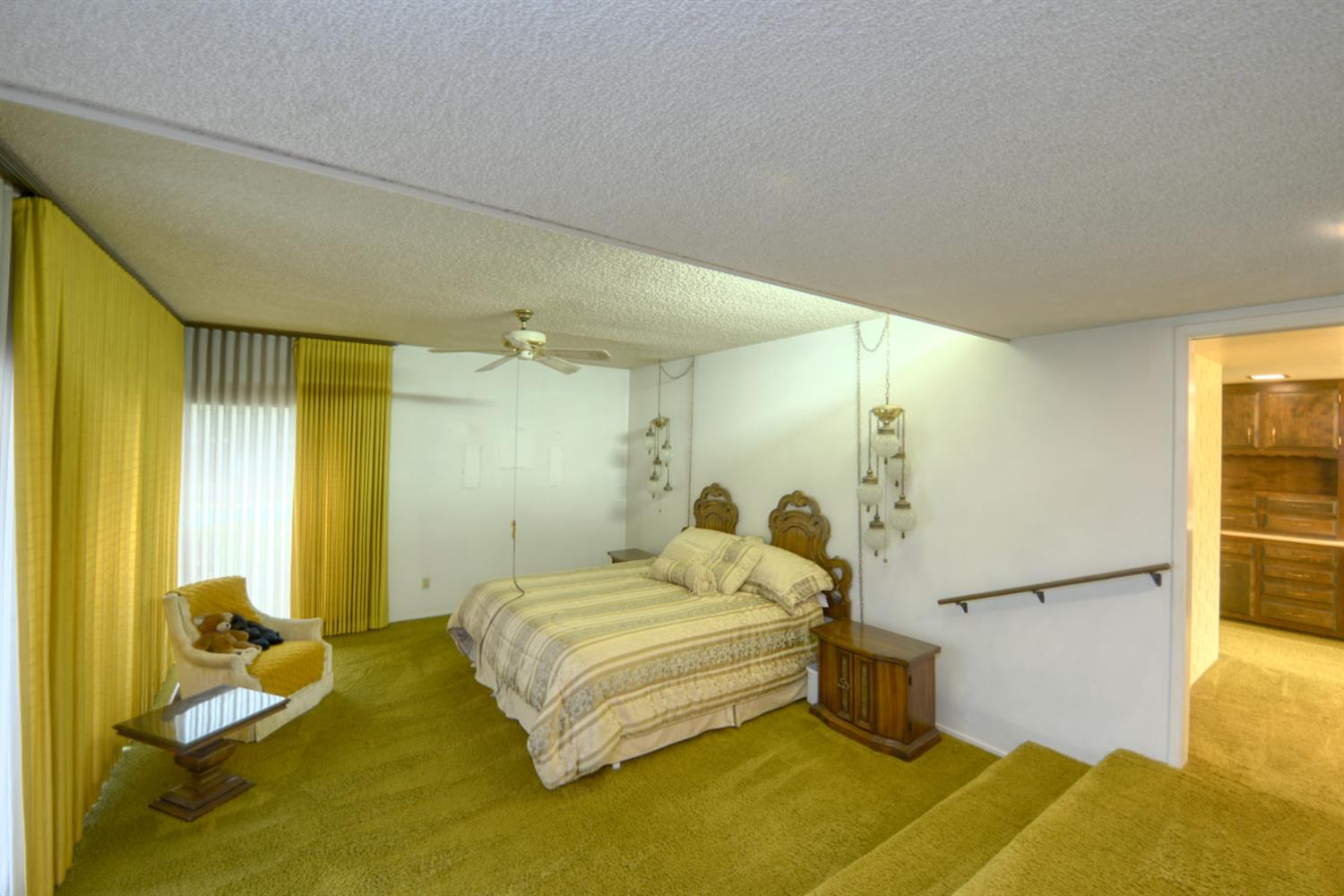1471 Highway 33 Gustine, CA 95322 - Photo 24 of 57 a bedroom with a bed and a table in it