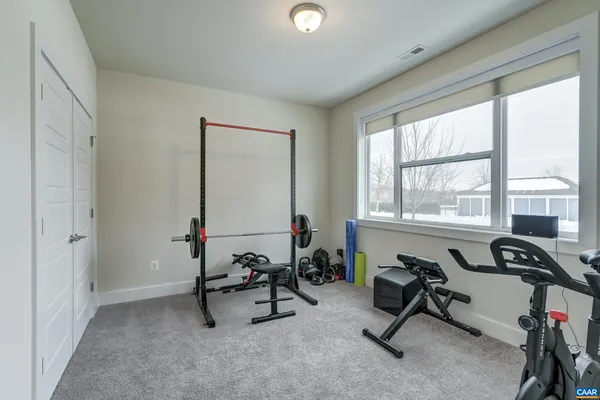 a view of a room with gym equipment