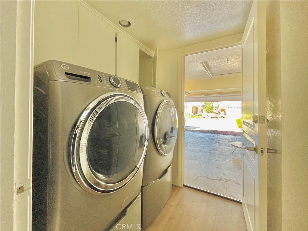 10 Ramada Irvine, CA 92620 - Photo 22 of 22 a utility room with dryer and washer